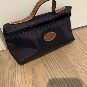 Longchamp purple makeup organizer